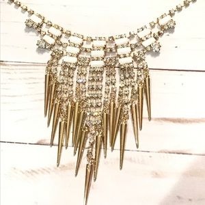 White and gold statement necklace with jewels